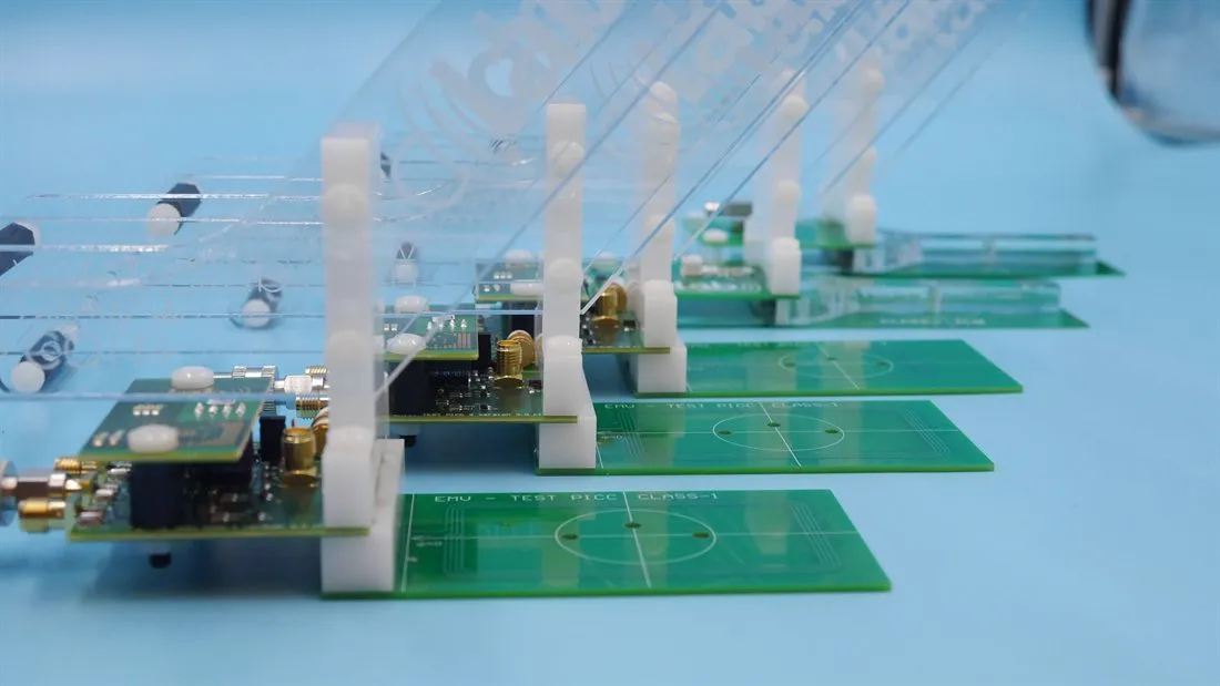 A row of cilab EMV® TEST-PICC Class 1 reference antenna assemblies on their acrylic stands